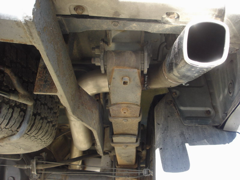 And looking up at the tight spaces between the tire and the trailer hitch.  There is no rubbing or rattling, and enough space so that the spare tire does not heat up.