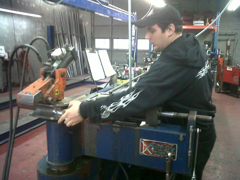 Ryan at the mandrel bender.  Apparently it's the only one in Western Canada.