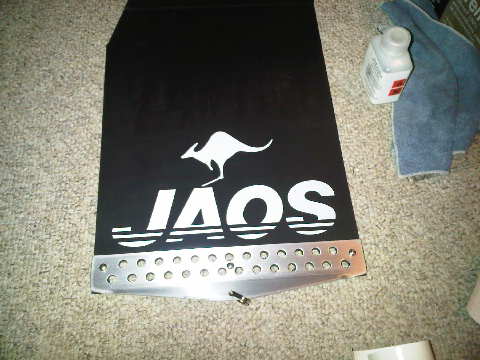 Decal is now on but doesn't want to stay stuck.. Vinyl decals don't stick to flexible rubber...duh.. solution?