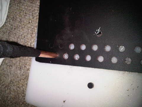 Made a hole punch out of 3/8ths copper by reaming the ID and sanding the OD to a point.. then 1 hour and 25 hand cramps later I had holes to match the fancy aluminum I had made up!