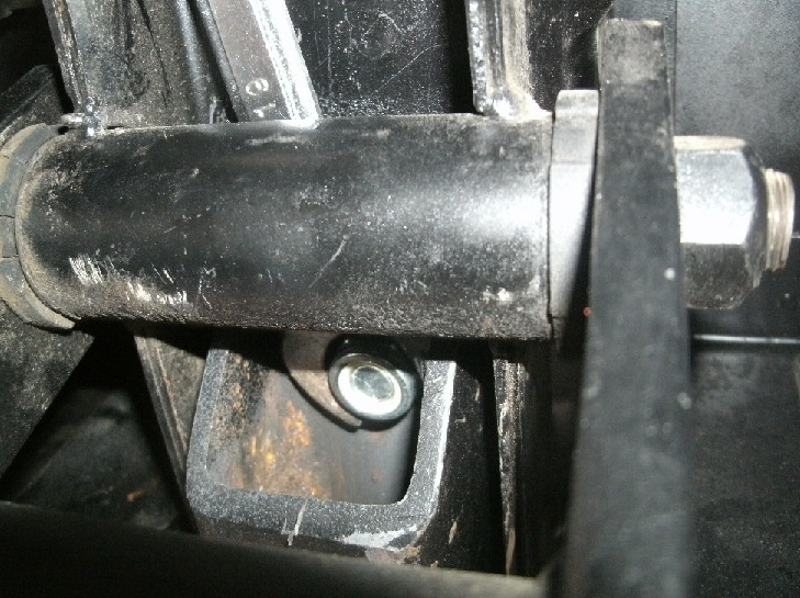 Easy access with 19mm wrench from the bottom through shackle, it sits there nicely while its tightened from the top.