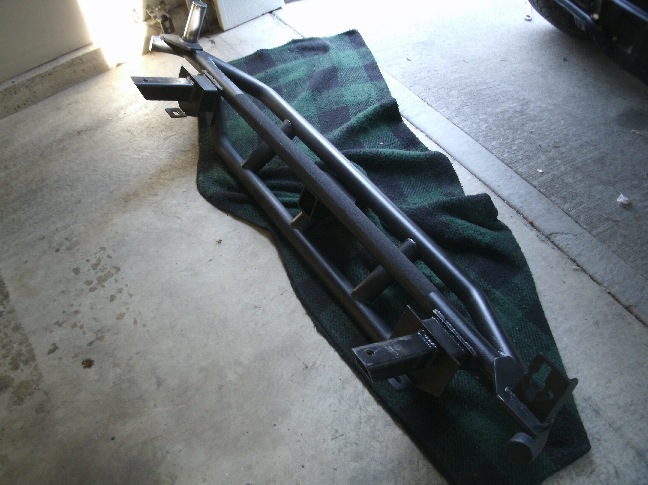 The bumper supports sit 37.75&quot; apart (inside dimensions)  Slide in nicely into the existing holes in the rear apron.  Note how similar the Jeeps frame mounts line up compared to the Deli...almost on center!!