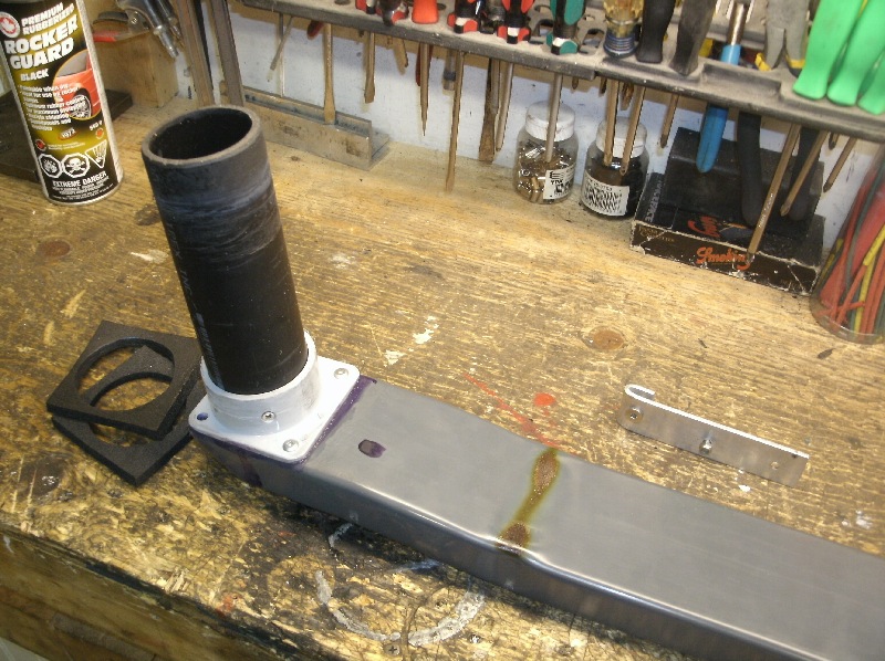 Molded the PVC with a heat gun, then sanded'er down and painted it with Rockguard