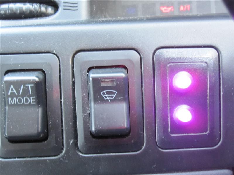 LED indicators showing all systems go in glorious Prince and the Revolution purple.