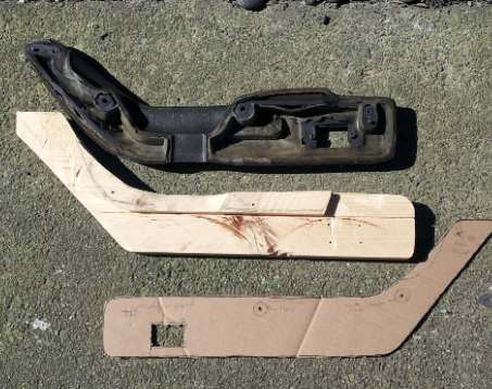 The old armrest, Template and the roughed-out piece.