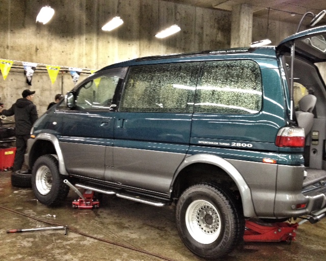 In the tire shop swappin' off the mud &amp; snows..