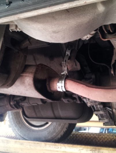Old exhaust hanging in there - just