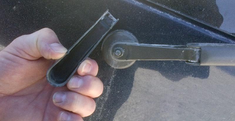 Wiper arm with cover off