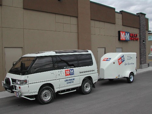 Here's what I pull.  It's my Lean Mean Special Events Machine.  We use it for doing BBQ's for charities and other events.  If there is a cooler M&amp;M Meat Shops rig out there I want to see pictures!