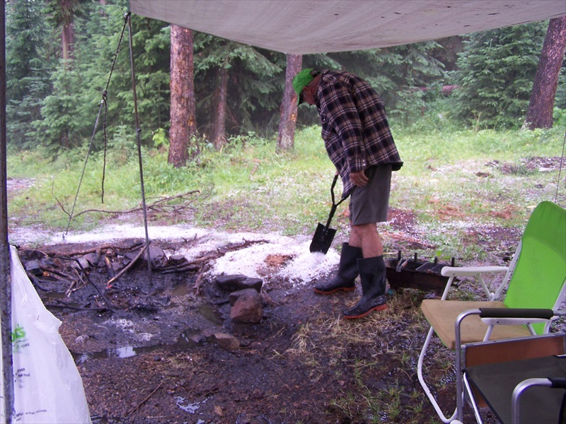 Hail piled up after sliding off the tarp