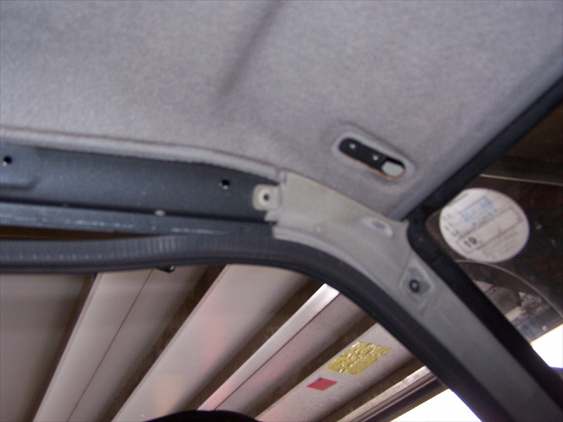 Roof trim held by door pillar trim