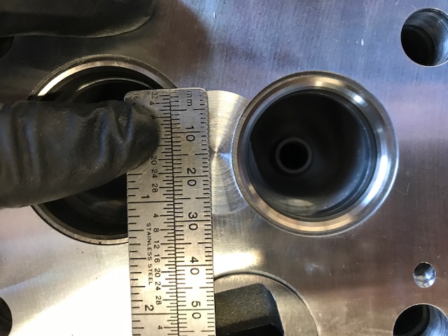Combustion chamber from replacement head