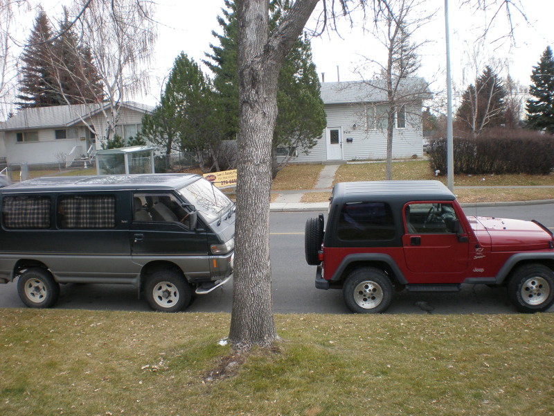 Brian purchased a 99 Jeep TJ in Calgary on our way back for $7800. Sucker :D