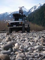 Set up for sleeping in the back..all the gear on the roof in Squamish Valley.