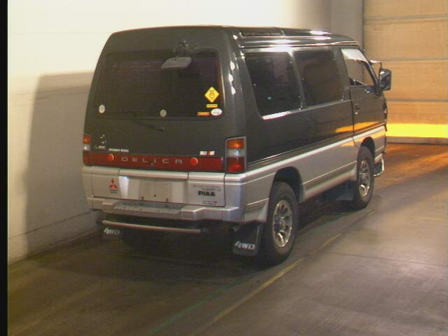 The decals on the back and on the window are gone now-on lower right now is five star auto decal.   On side is&quot;4 wheel drive&quot; decal, I think. Please note ripples on rear window and xtra round reflectors.