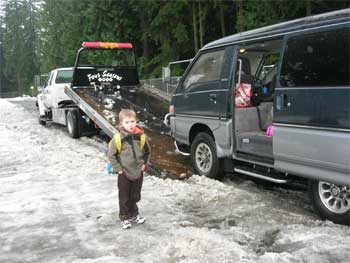 the tow truck driver towed us off the I-5 shoulder to a rest stop where we got into our cab