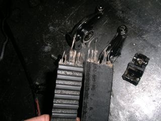Old, contaminated belt that was too loose. The belts had apparently been serviced in Japan before delivery (uh, yeah, sure...)