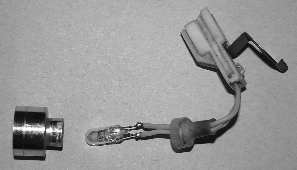 The replacement bulb soldered to the wires.