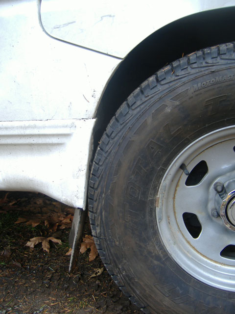 front tire drivers side with wheel touchin