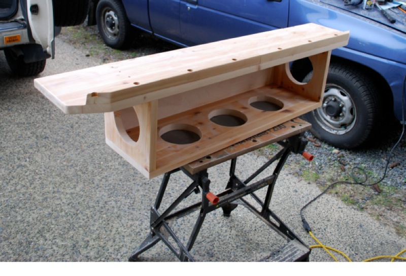 Holes are to cut down on the weight. The table-top used is 1&quot; thick, quite heavy. The holes made a difference of a couple of pounds!