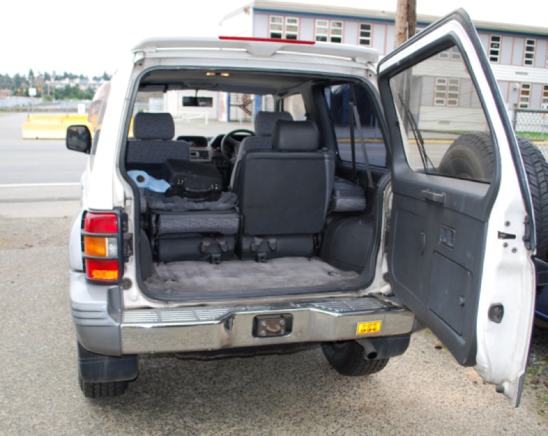 It's a Pajero, not a Delica with a side-swing door.