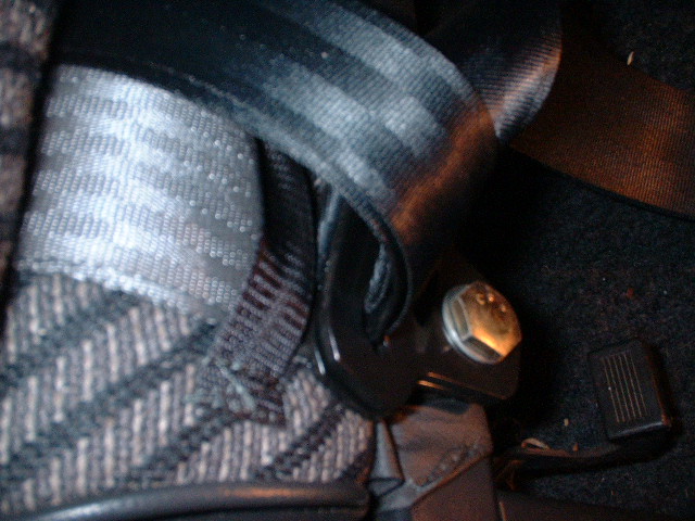 female buckle mounting on rear of bench seat.