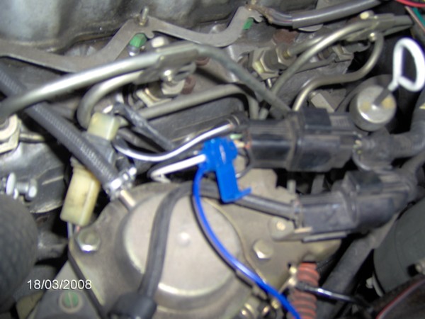 The blue wire here is the speed sensor wire from the cruise and is hooked to the tachometer.