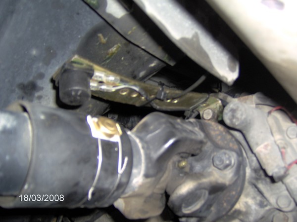 One magnet wired to the drive shaft and the sensor mounted above it so it is well protected.  Only needed to make a slight modification to the original sensor bracket to make it work.