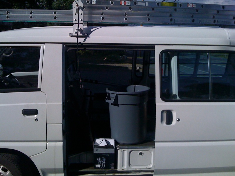 Sliding doors on both sides - cool. In the step on each side, there is a little storage compartment - very handy.