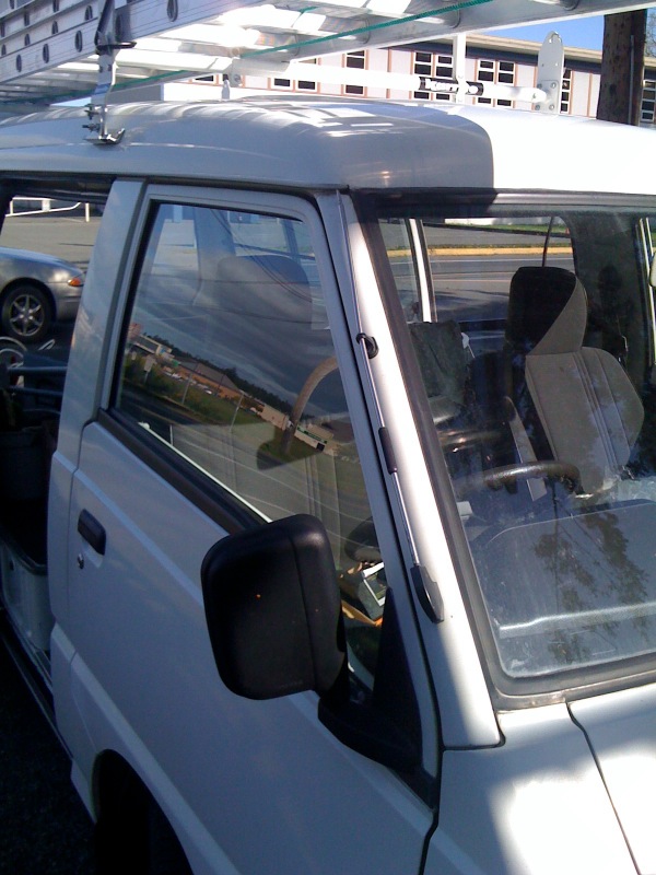 The radio antenna is better arranged (I think) with a more traditional full-pillar mounting.
