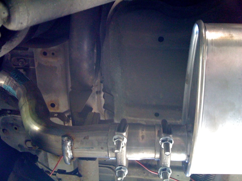 The original muffer came back as far as the mounting bracket which is welded just before the bend upwards over the axle. This muffler is much shorter and smaller around in size.