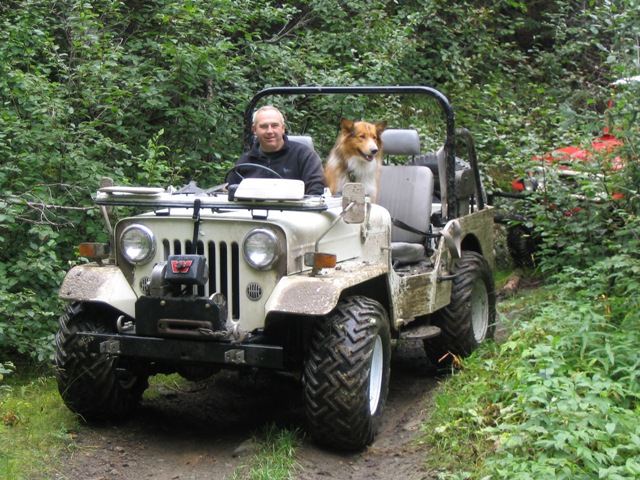 my J54 Mits Jeep.<br />note the tires, agressive with wide voids. these little tires can float the jeep over some really soft terrain without leaving a mark plus the tread design gives wicked traction in snow, mud, gravel, grass etc (sucks on ice)<br />the J54 is already built with the proper gearing needed so no mods were required other than the winch and tires.<br />wicked little trucks for exploring the outdoors.