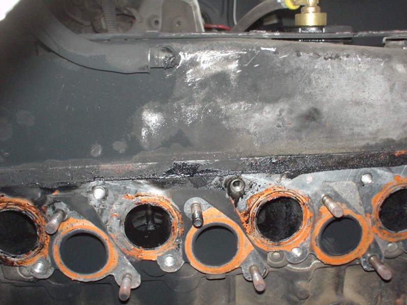 Problems of a leaky valve cover. Although you wouldn't expect it to 'really' cause a problem oil will seep down and get into stuff. It's an easy fix. Just do it.